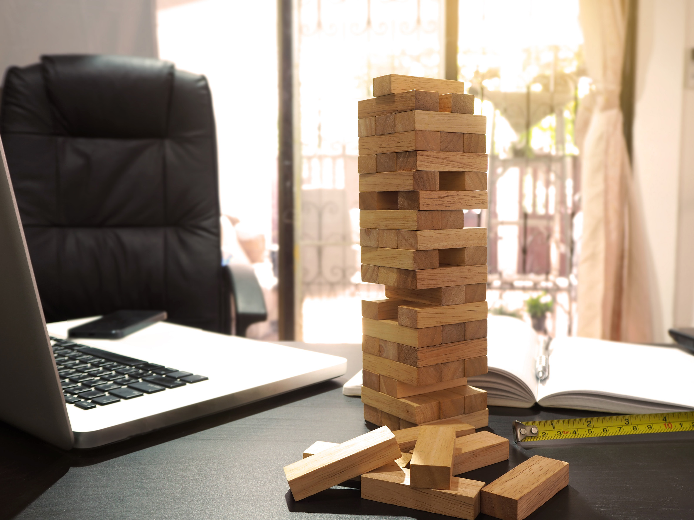 engineer desk with a blocks wood tower game plan construction p