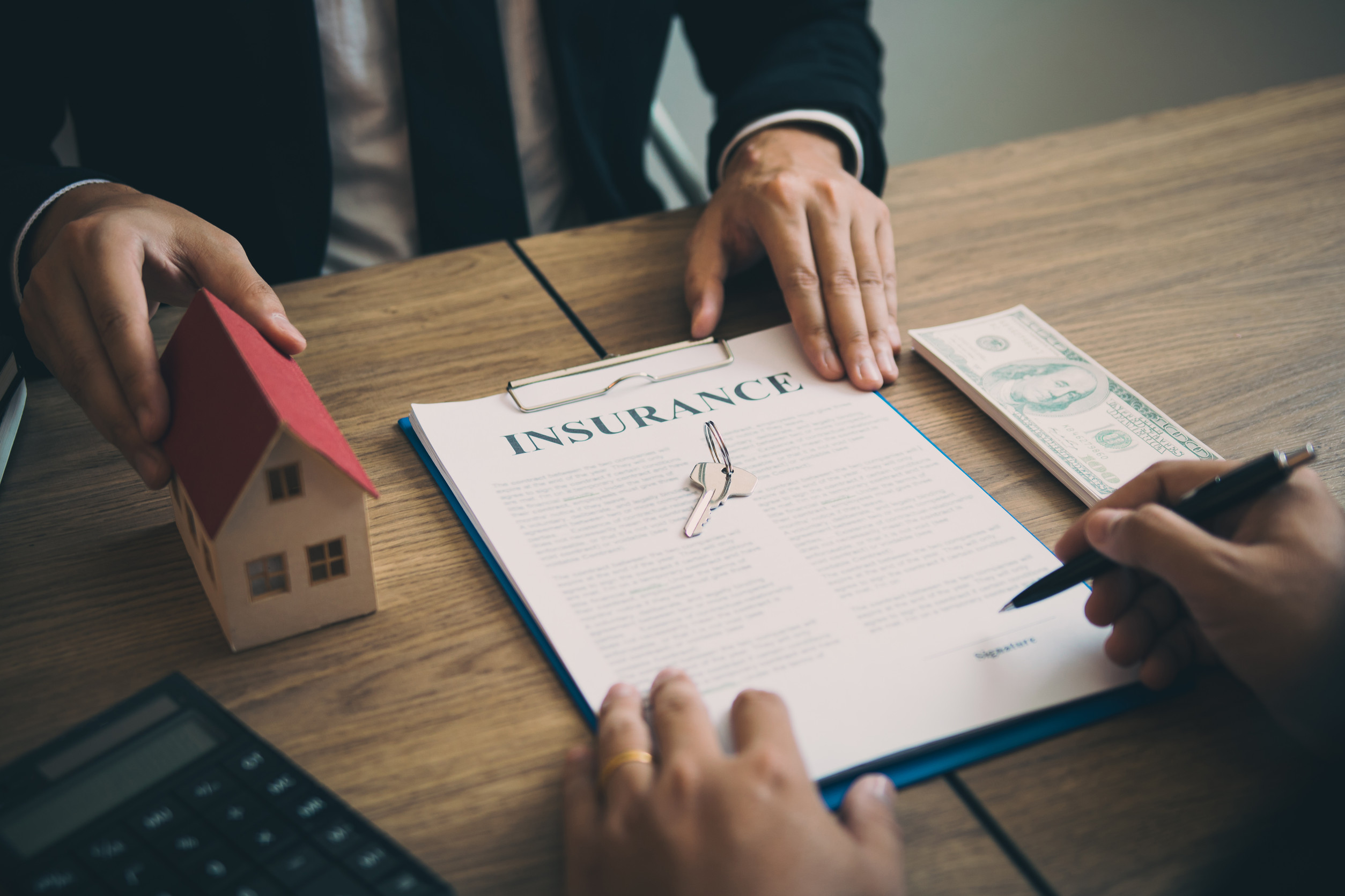 Real estate agent discussion about signing on paper financial co